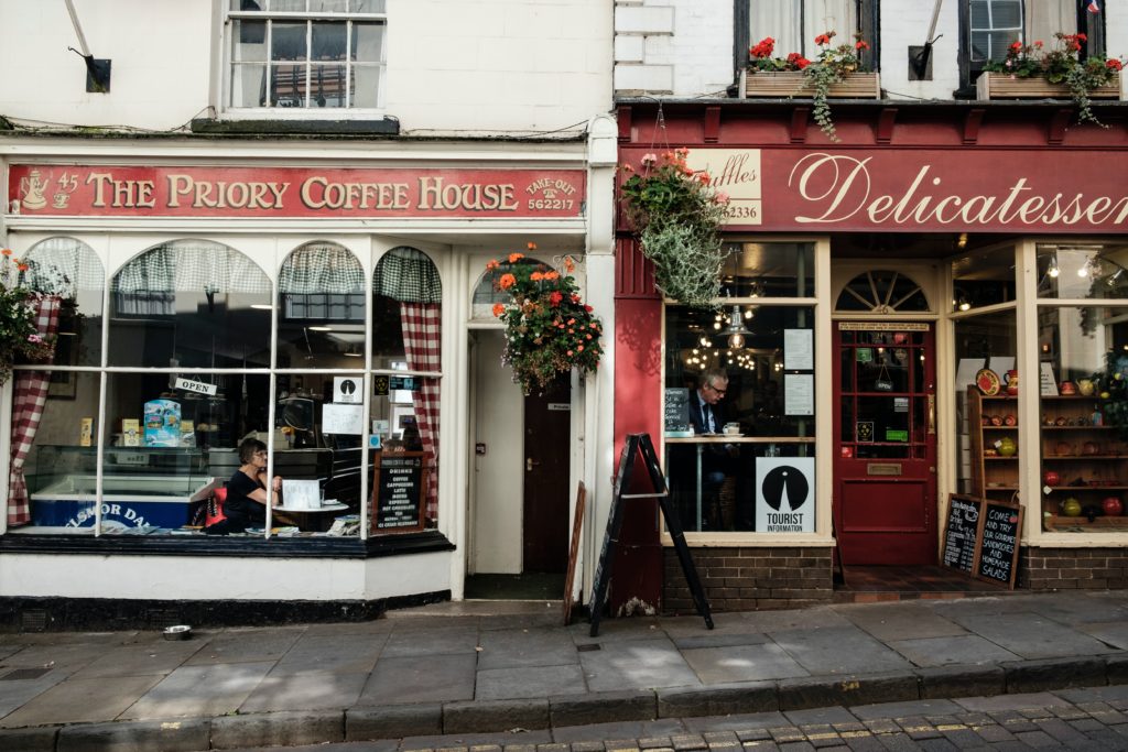 ways small businesses benefit the community by building community identity